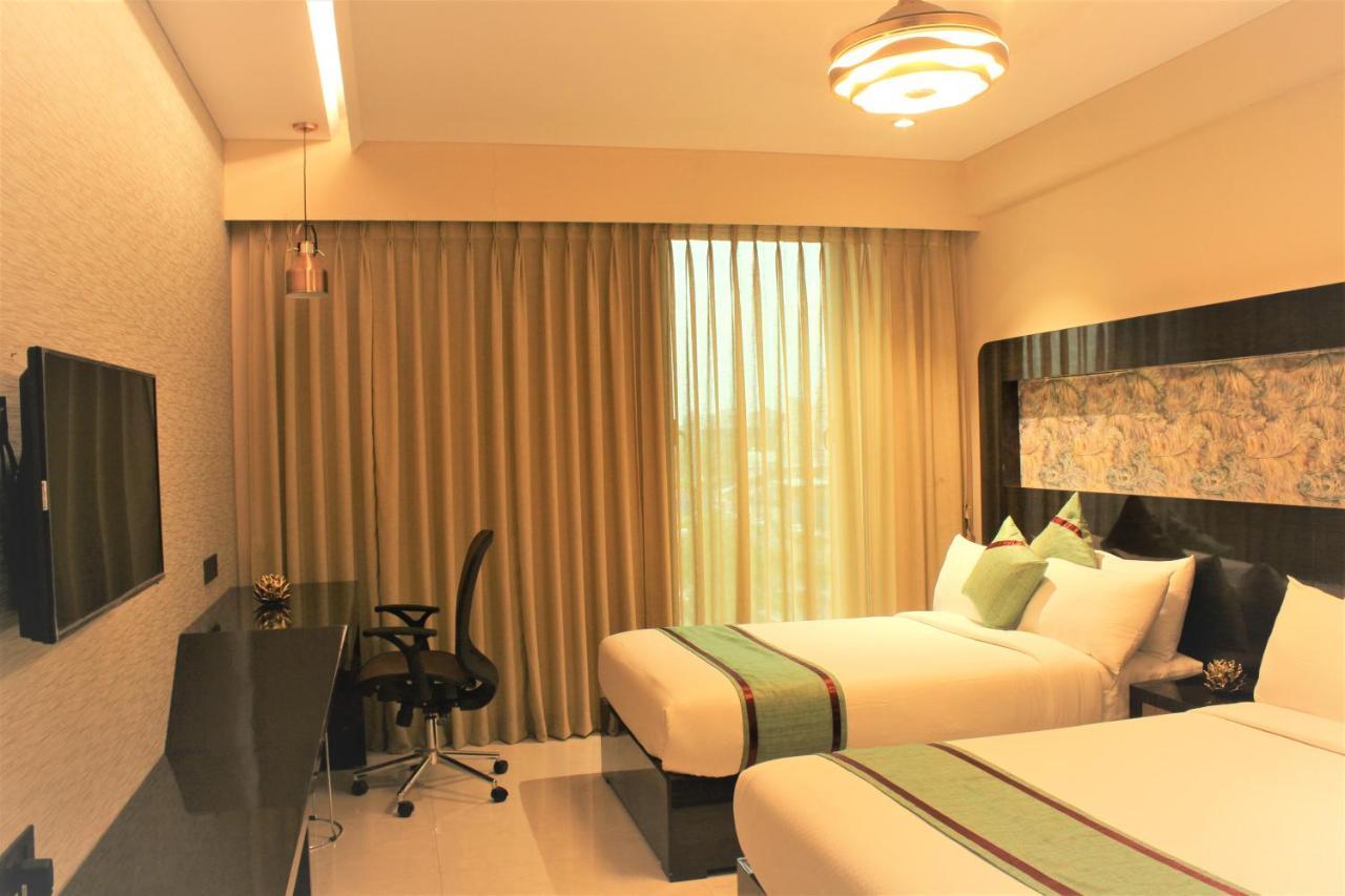 Zip By Spree Hotels Surat Exterior photo